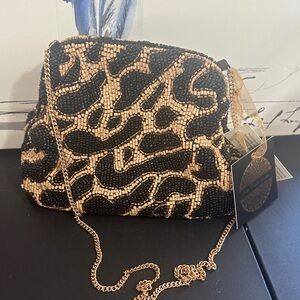 From India to you cheetah beaded clutch and gold crossbody chain bag